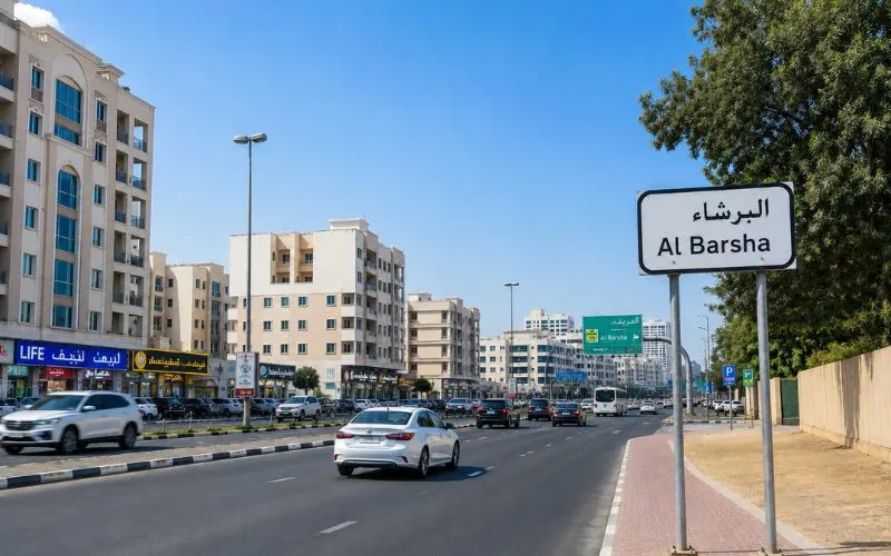 Al Barsha Dubai street with residential buildings and city traffic