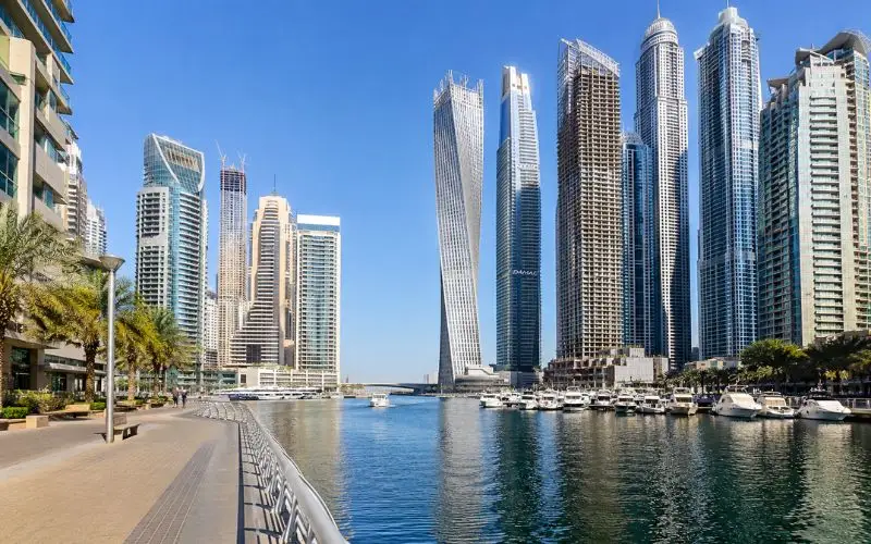 Dubai Marina waterfront with yachts and high-rise buildings